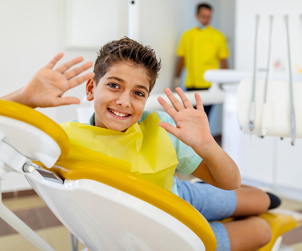At what age should my child first visit an orthodontist?